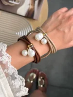 دستبند طرح طلا مرواریدی