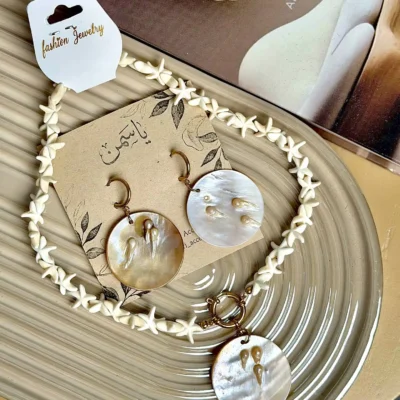 ست گوشواره و گردنبند صدف دایره